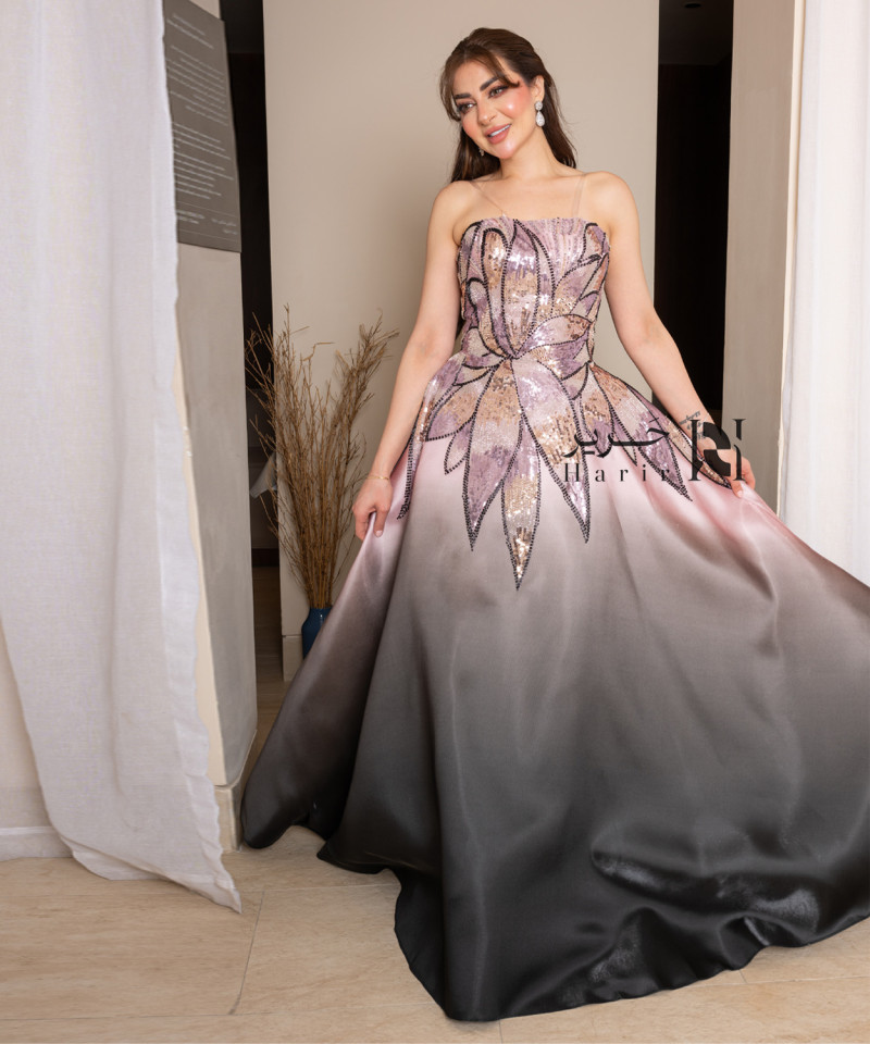 Ombre evening gown in pink and black with shimmering embroidery and a luxurious floral design