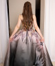 Ombre evening gown in pink and black with shimmering embroidery and a luxurious floral design