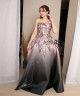 Ombre evening gown in pink and black with shimmering embroidery and a luxurious floral design