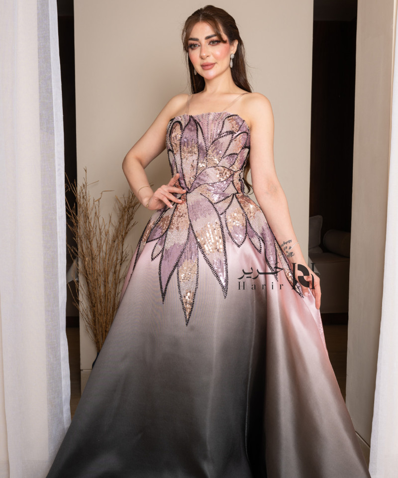 Ombre evening gown in pink and black with shimmering embroidery and a luxurious floral design