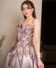 Ombre evening gown in pink and black with shimmering embroidery and a luxurious floral design