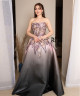 Ombre evening gown in pink and black with shimmering embroidery and a luxurious floral design