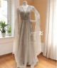 Elegant Off-White Evening Gown with Crystal Embellishments and Flowing Cape Sleeves Elegant Off-White Evening Gown with Crystal Embellishments and Flowing Cape Sleeves
