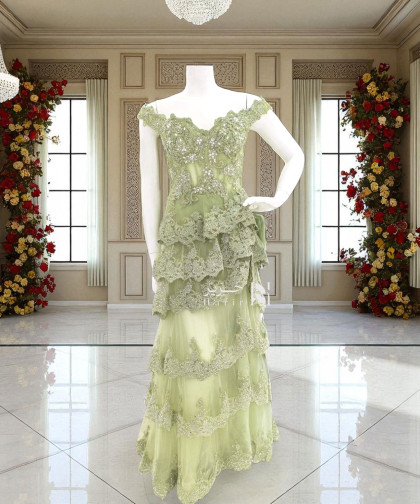 فستان سهرة فستقي بطبقات دانتيل مطرزة