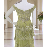 فستان سهرة فستقي بطبقات دانتيل مطرزة