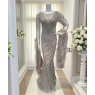 Elegant evening gown in a light gray color with a hint of lavender.      