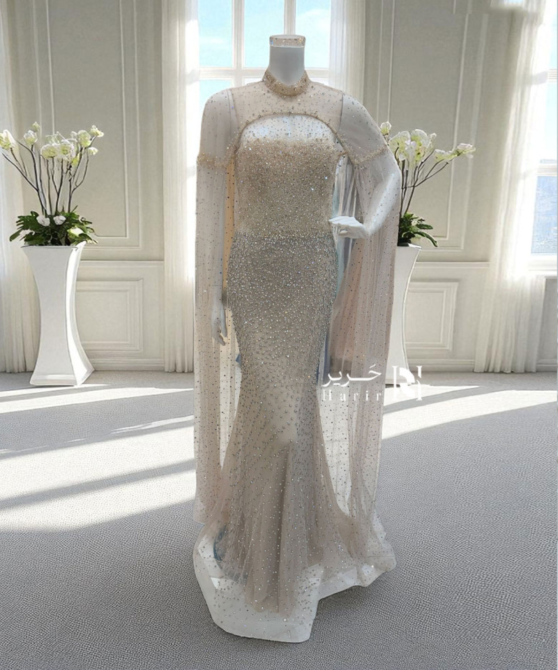 فستان سهرة بيج مطرّز بكاب لامع فخم