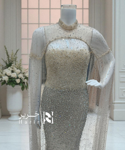 فستان سهرة بيج مطرّز بكاب لامع فخم