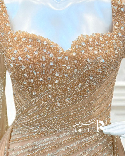 Peach Evening Gown with Luxurious Embroidery and Sheer Long Sleeves -
