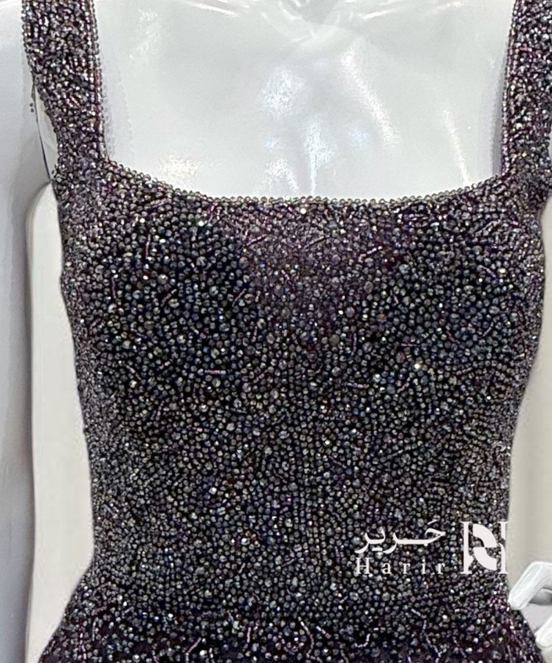 فستان سهرة بنفسجي مطرّز بكورساج رباط