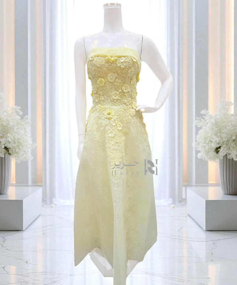 فستان سهرة أصفر مطرّز بالورود ثلاثية الأبعاد