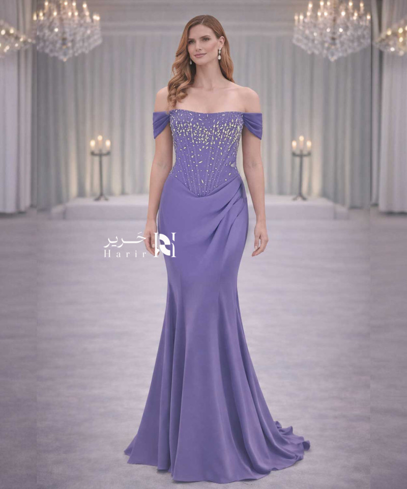 فستان سهرة بنفسجي كريب فاخر مطرّز بالكريستال بقصة صدر أوف شولدر (Off Shoulder)