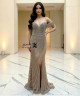 Champagne off-shoulder mermaid evening dress with crystal beaded embroidery and side slit.