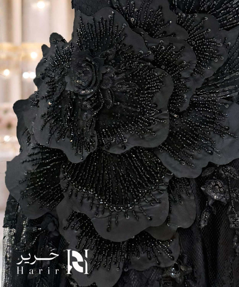 فستان سهرة أسود فاخر بتطريز خرز ثلاثي الأبعاد وقصة كتف واحد