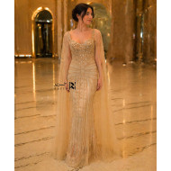 Luxury Gold Evening Gown with Crystal-Embellished Corset and Flowing Tulle Cape