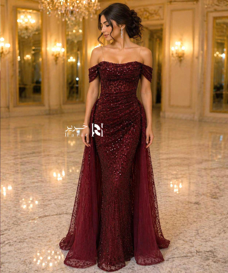 Luxury burgundy evening dress with shimmering embellishments and off-shoulder sleeves