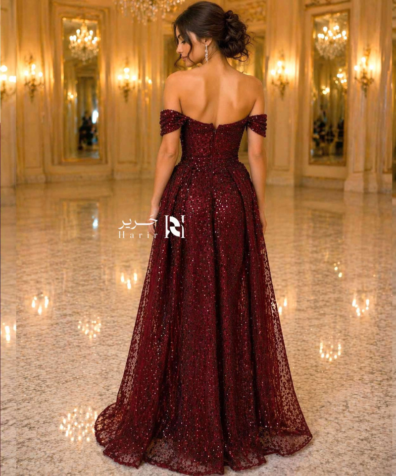 Luxury burgundy evening dress with shimmering embellishments and off-shoulder sleeves