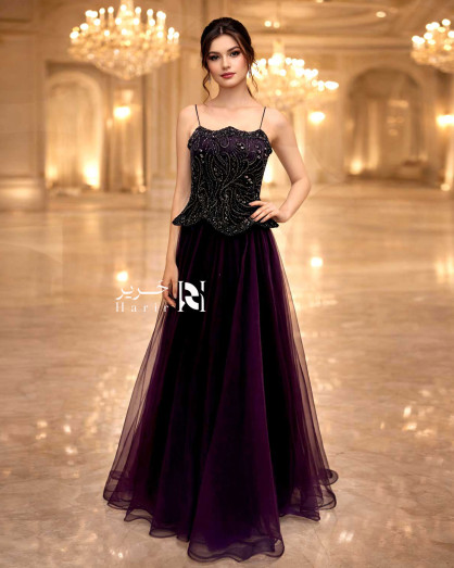 Dark purple evening dress with a luxurious corset design and hand embroidery
