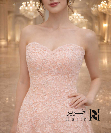 فستان سهرة وردي ناعم بتصميم قلب وتطريز فاخر