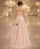 Soft pink evening dress with a sweetheart design and luxurious embroidery