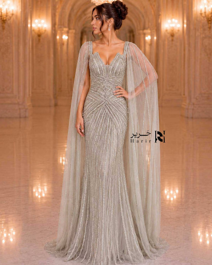 Luxury Silver Champagne Crystal Embroidered Evening Dress with V-Neckline, Sheer Tulle Cape and Mermaid Silhouette - Luxury Silver Champagne Crystal Embroidered Evening Dress with V-Neckline, Sheer Tulle Cape and Mermaid Silhouette -
