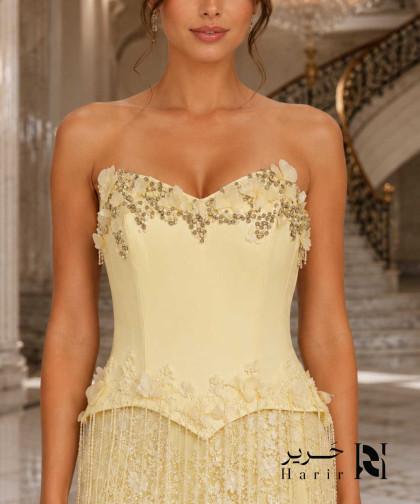 فستان سهرة أصفر ليموني فاخر بقصة كورسيه بدون أكتاف وتطريز زهور ثلاثية الأبعاد