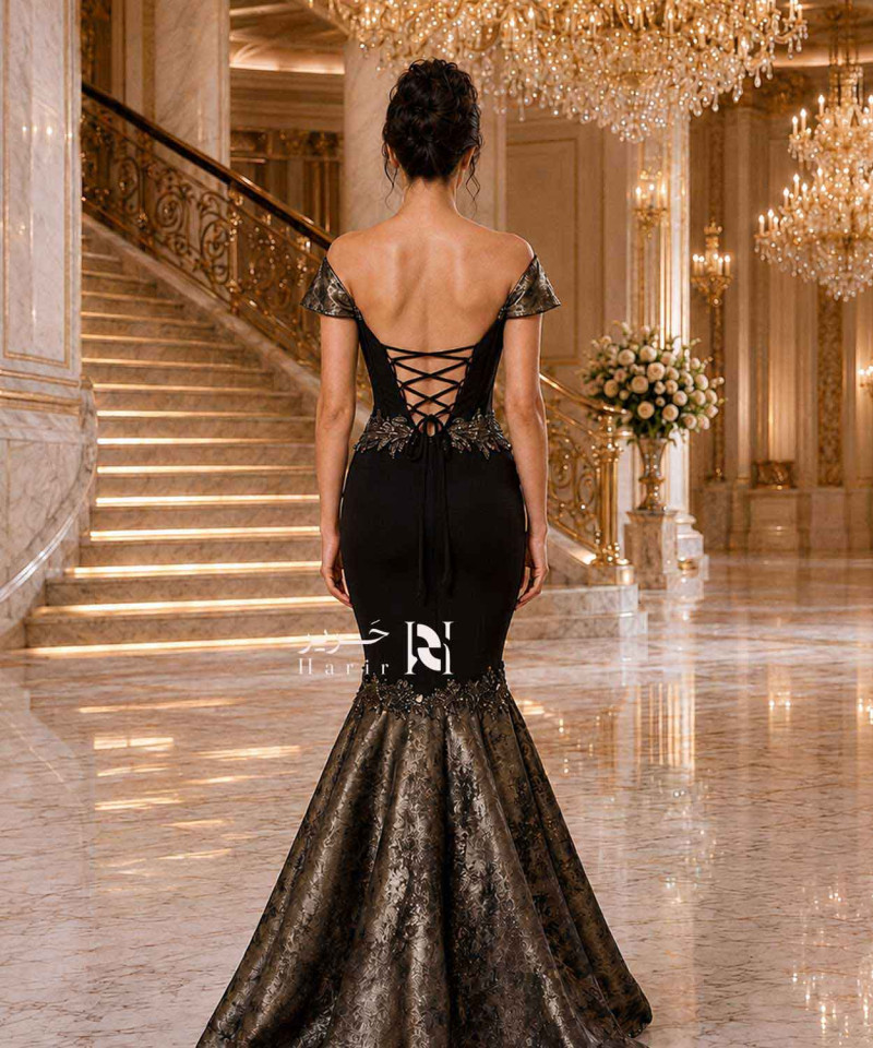 فستان سهرة أسود ميرميد أوف شولدر بتطريز فاخر ولمسات برونزية – تصميم كورسيه أنيق