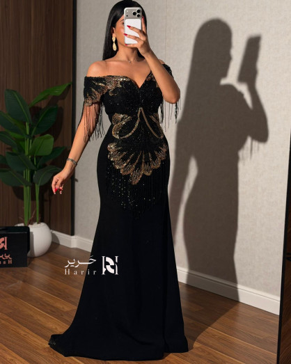 black dress with gold fringe and Embroidered Evening Luxury Details giallo